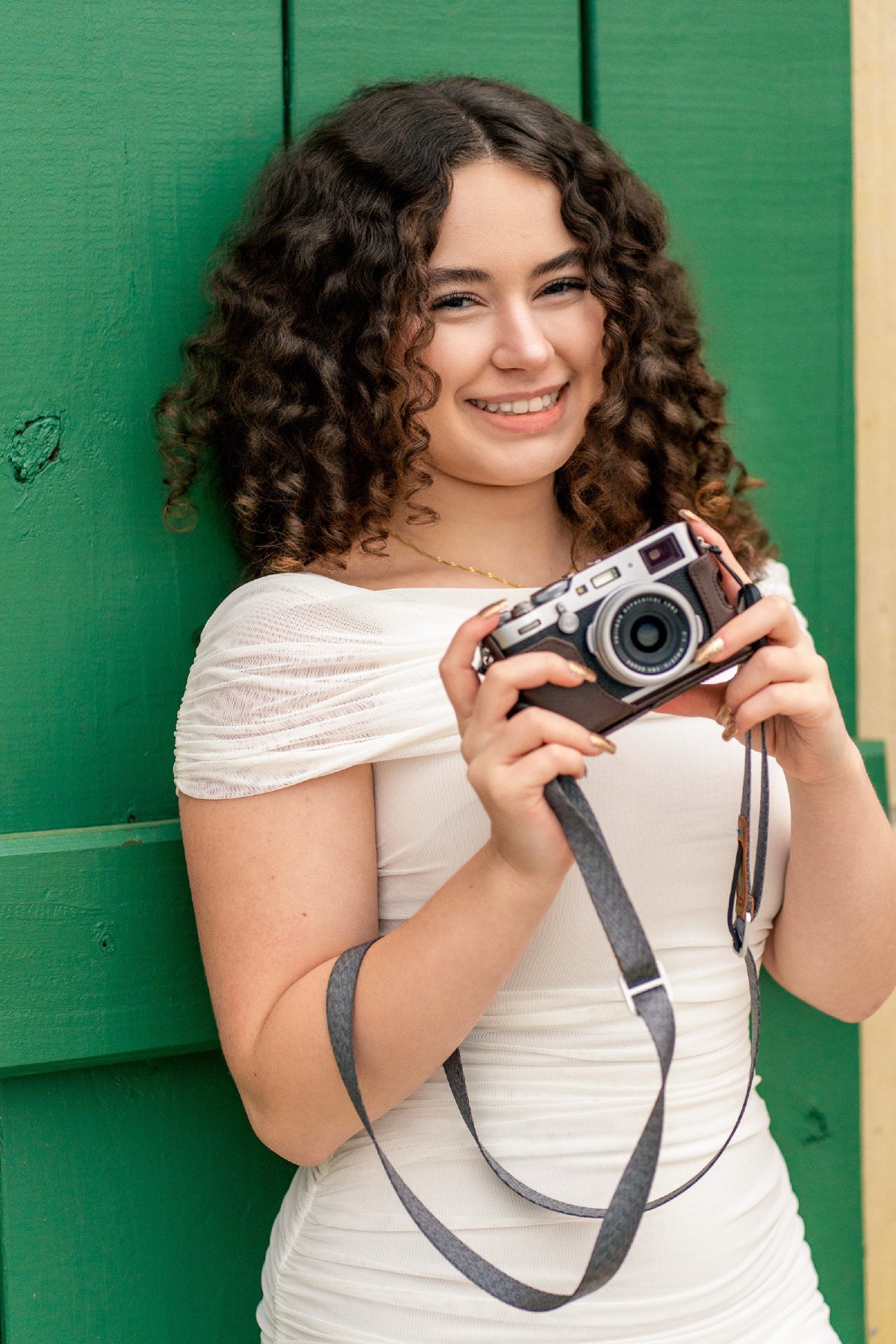 Sophia - Senior Portraits at Adriatica Village — frame 13 of 22