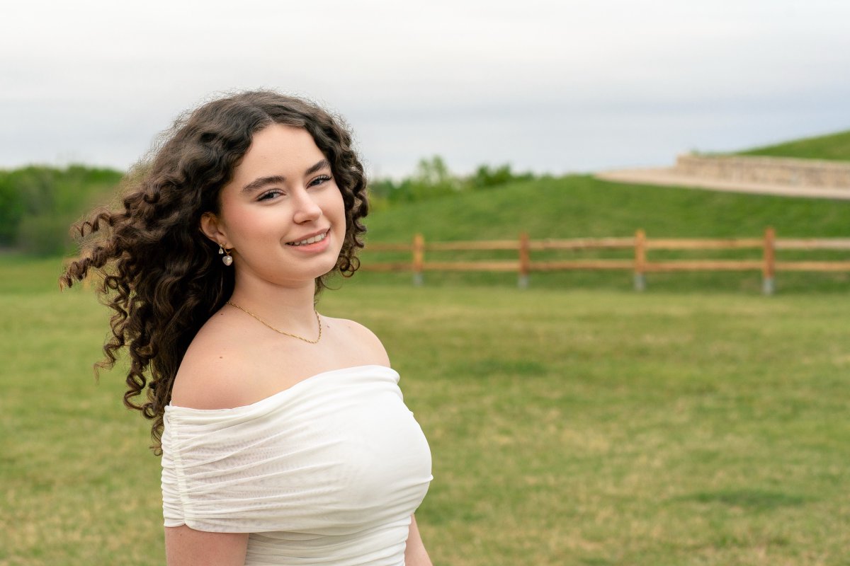 Sophia - Senior Portraits at Adriatica Village — frame 18 of 22