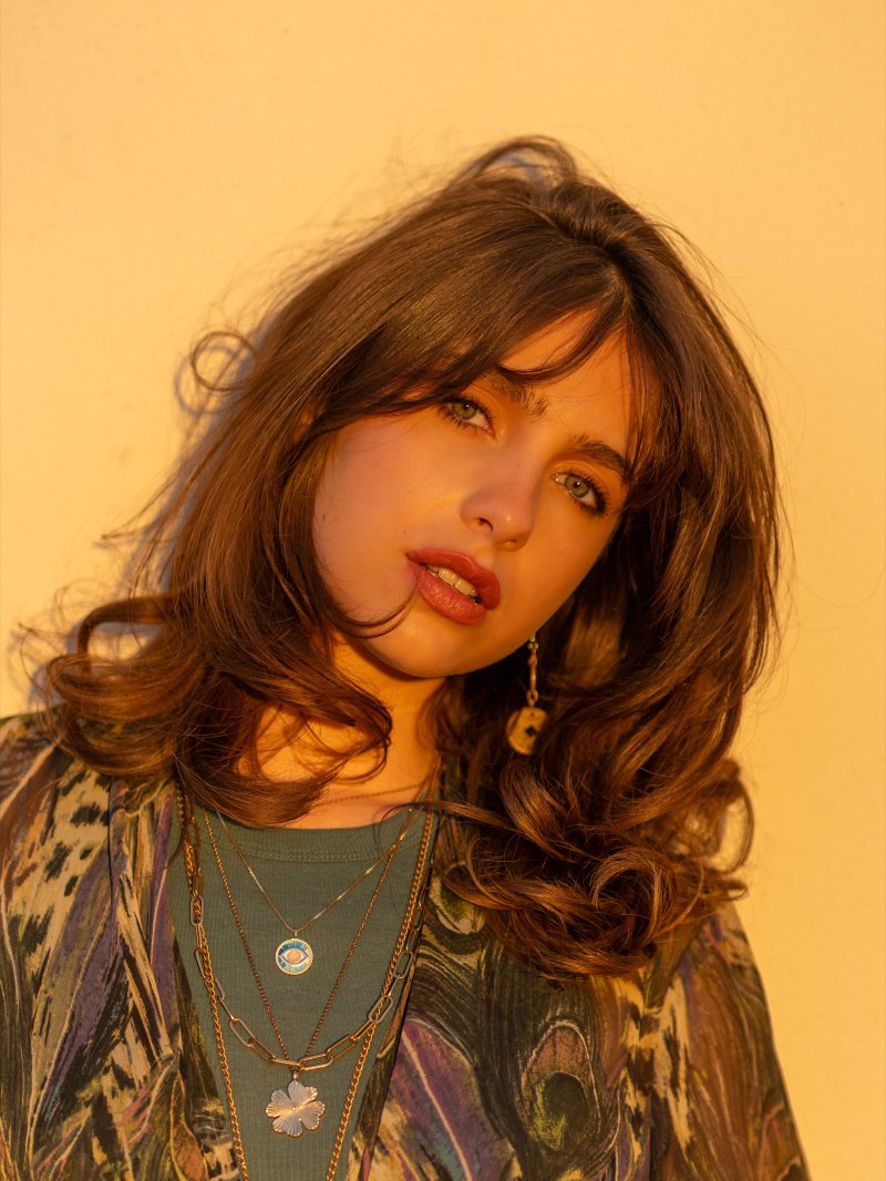 Senior portrait of Maya in downtown Plano