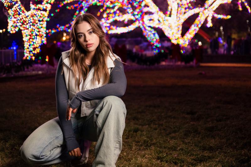 Night portrait session with city lights in the Dallas area