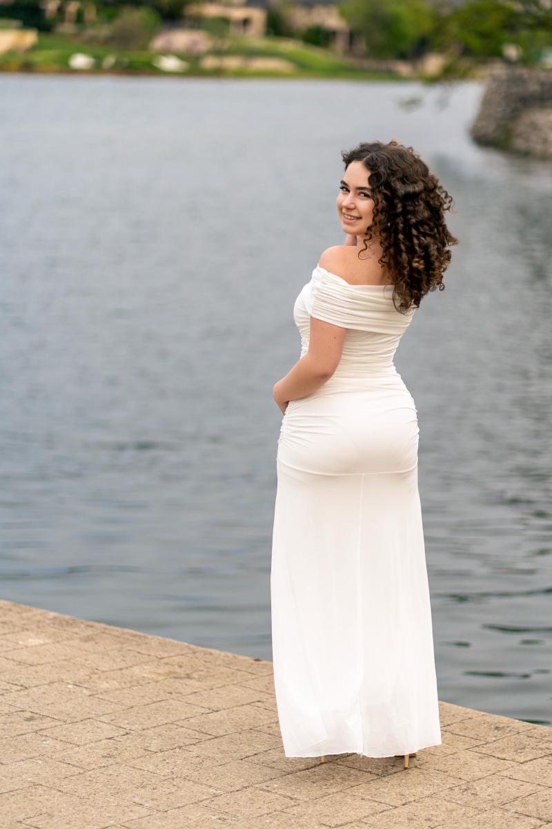 Senior portrait of Sophia lakeside at Adriatica Village in McKinney, TX